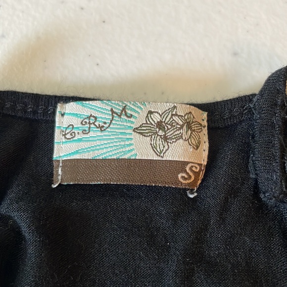 Black shirt. With straps that criss cross in the back. Sz small - Picture 6 of 7
